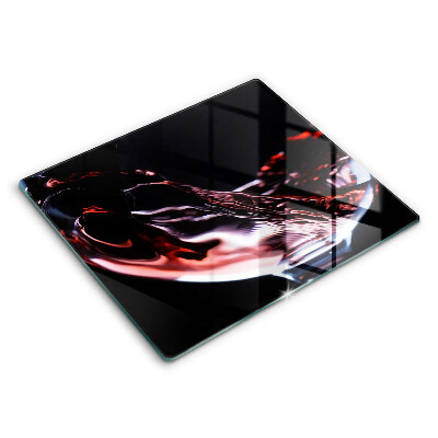 Sklenená doska na krájanie 60x52 cm Pohyb červeného vína v skle