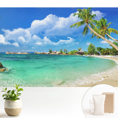 Tapeta na stenu s motívom exotickej plážovej zelene a paliem