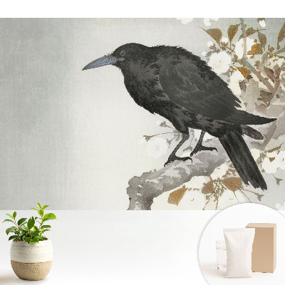 Luxusná tapeta Jemný havran na pozadí kvitnúcich konárov