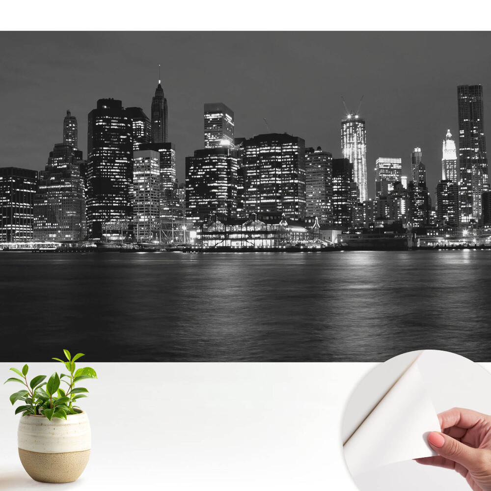 Tapeta do obývačky Panoráma mesta v noci s odrazom vo vode