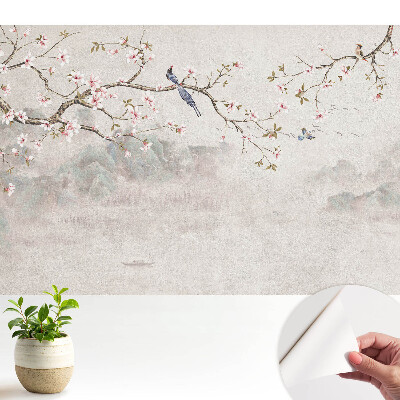 Tapeta do obývačky s jemnými kvetmi a vtákmi na pozadí hôr
