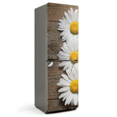 Fototapeta na chladničku Kvety na drevenom pozadí