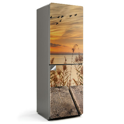 Fototapeta na chladničku Západ slnka nad vodou