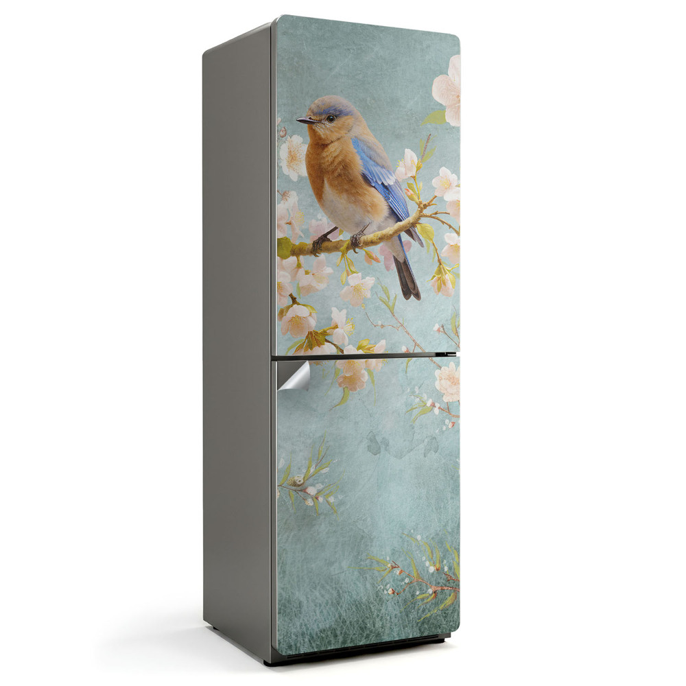 Fototapeta na chladničku Vták na konári s kvetmi