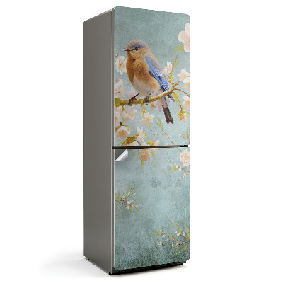 Fototapeta na chladničku Vták na konári s kvetmi