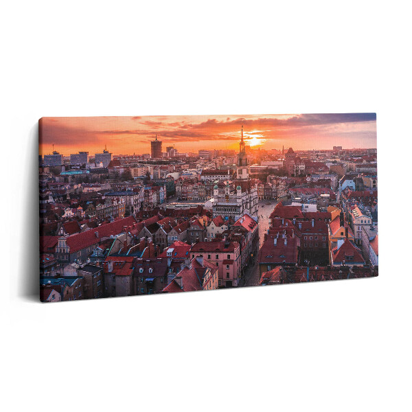 Fotoobraz na plátne 100x50 Západ slnka nad mestom.