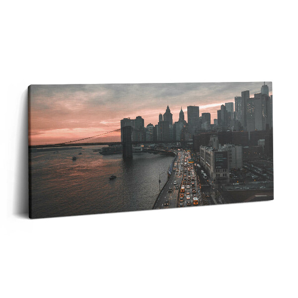 Obraz na plátne 120x60 Most a mesto pri západe slnka