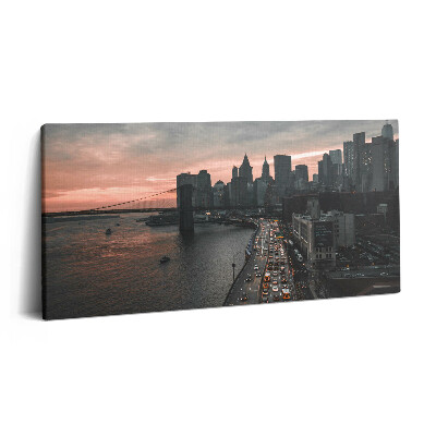Obraz na plátne 120x60 Most a mesto pri západe slnka