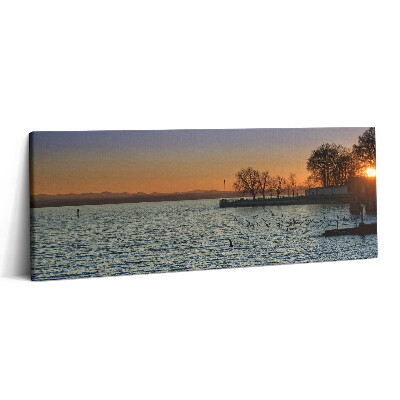 Obraz na plátne 125x50 Západ slnka nad jazerom a stromami