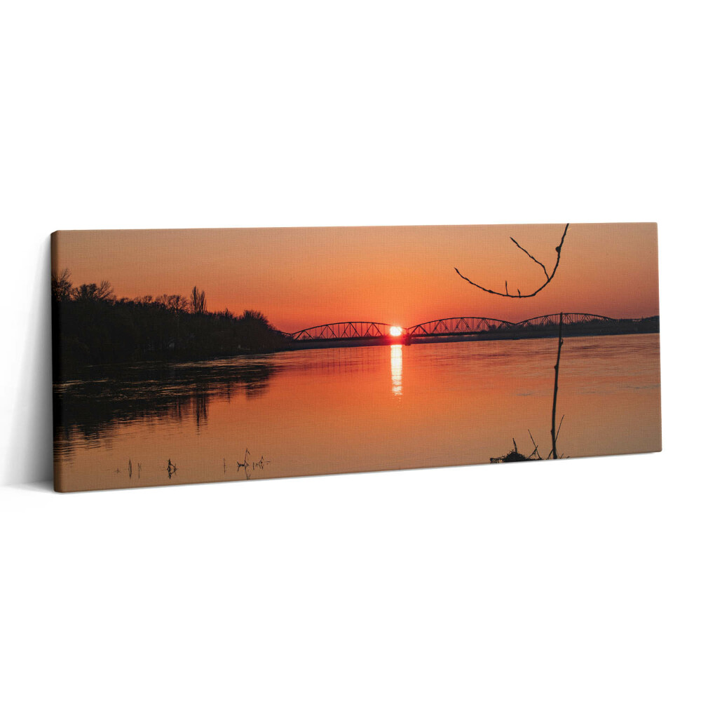 Obraz na plátne 125x50 Západ slnka nad riekou a mostom