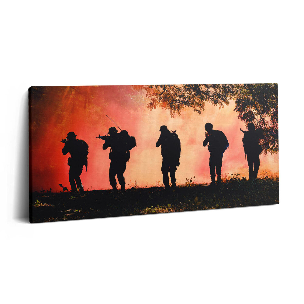 Fotoobraz na plátne 140x70 Siluety vojakov pri západe slnka
