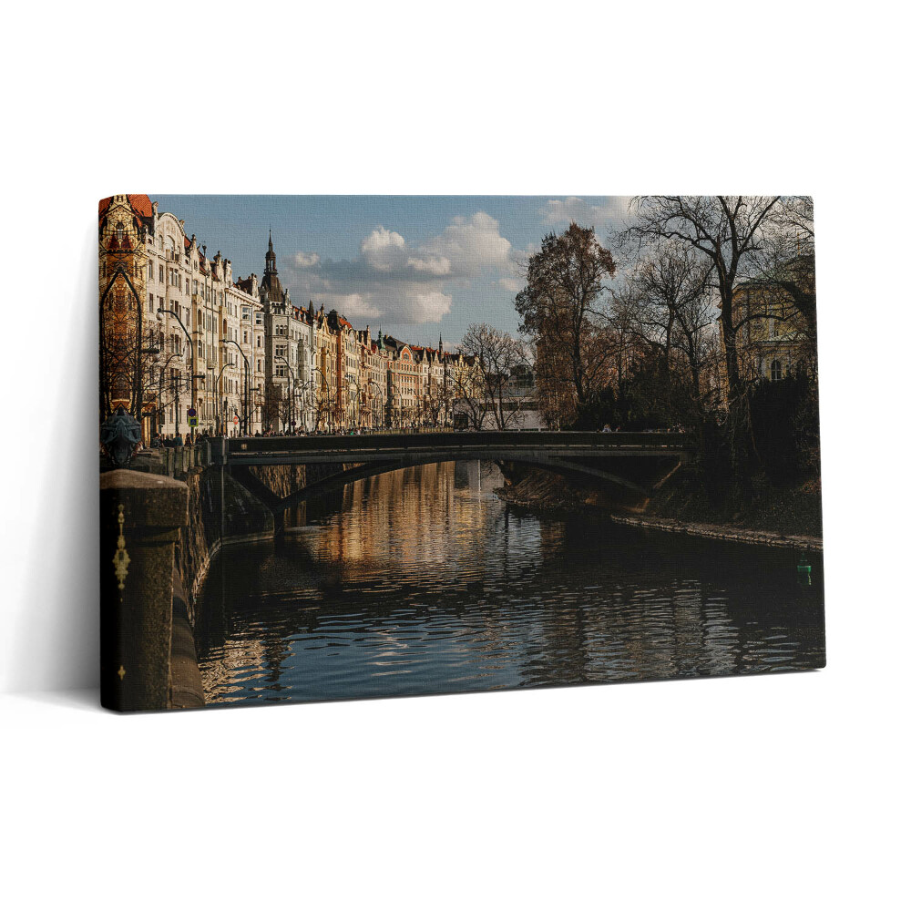 Obraz na plátne 30x20 Mesto pri rieke za súmraku