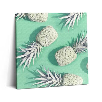 Fotoobraz na plátne 60x60 Biele ananásy na tyrkysovom pozadí
