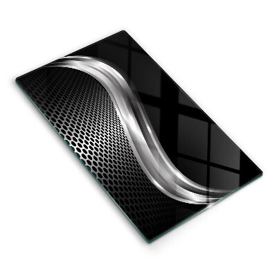 Krycia doska na sporák Kovová vlna na čiernom pozadí