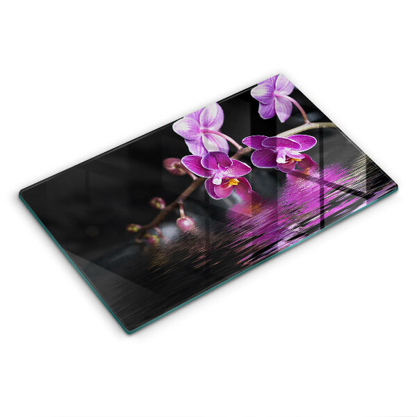Kryt na indukčnú dosku Fialové orchidey na vode