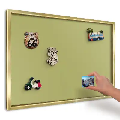 Magnetická tabuľa na cestovateľské suveníry so zeleným vintage pozadím